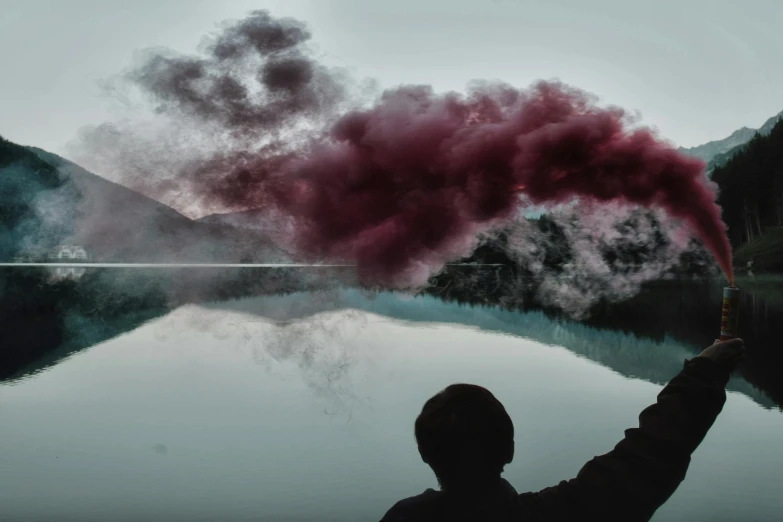 a person standing in front of a body of water with smoke coming out of it, pexels contest winner, maroon mist, tinted colours, toxic clouds, pools of blood