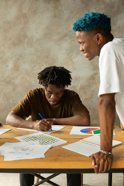 a group of people sitting around a wooden table, pexels contest winner, academic art, two young men, graphs, black man with afro hair, teaching