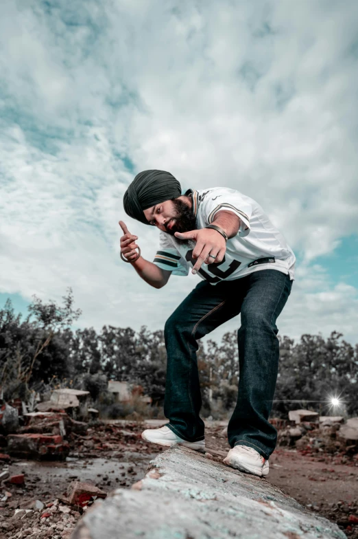 a man riding a skateboard on top of a rock, an album cover, by Manjit Bawa, pexels contest winner, angry and pointing, smoking with squat down pose, standing in a field, shot on an iphone