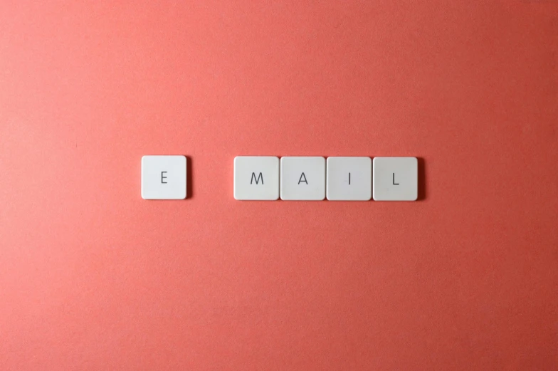 the word email spelled in scrabbles on a pink background, by Carey Morris, trending on pexels, letterism, square, salmon, a small, milk