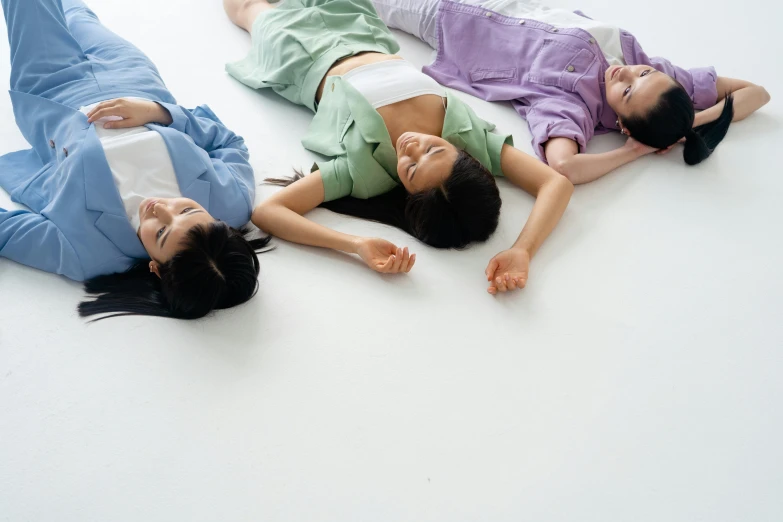 a group of women laying on top of each other, inspired by Fei Danxu, unsplash, gutai group, studio kyoto, quiet beauty, けもの, three-dimensional