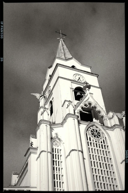 a black and white photo of a clock tower, by Kristian Kreković, baroque, in sao paulo, cathedral!!!!!, marilyn church h, square