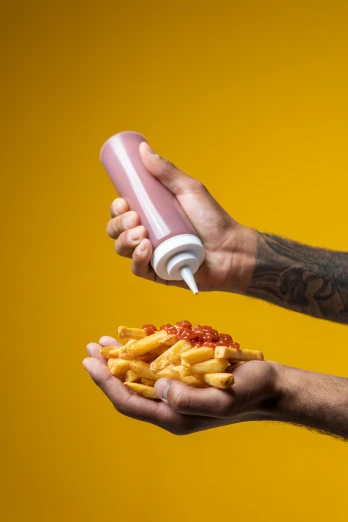 a man holding a bottle of ketchup and a plate of food, inspired by Heinz Anger, pexels, hyperrealism, pink, french fries as arms, dramatic product lighting, mayonnaise
