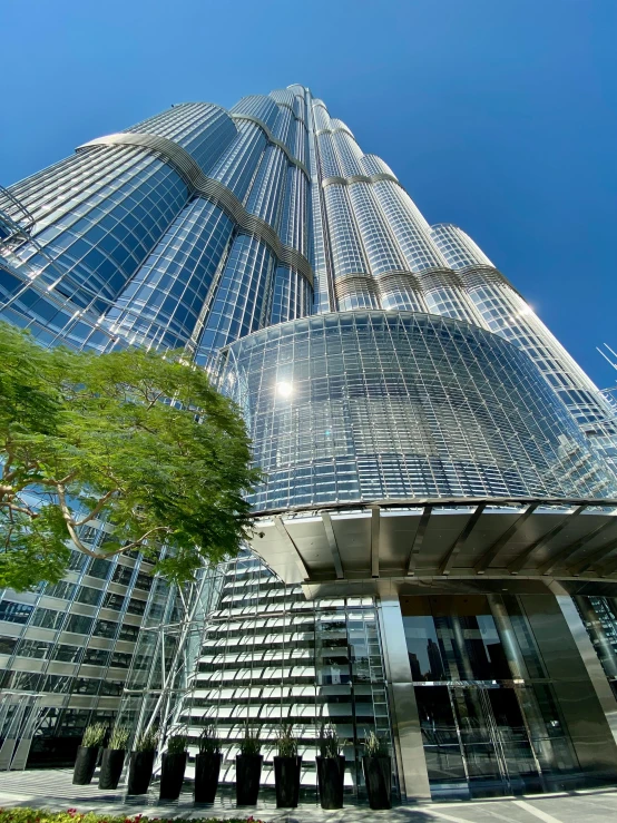 a very tall building with a lot of windows, that is 1300 feet tall, award-winning”