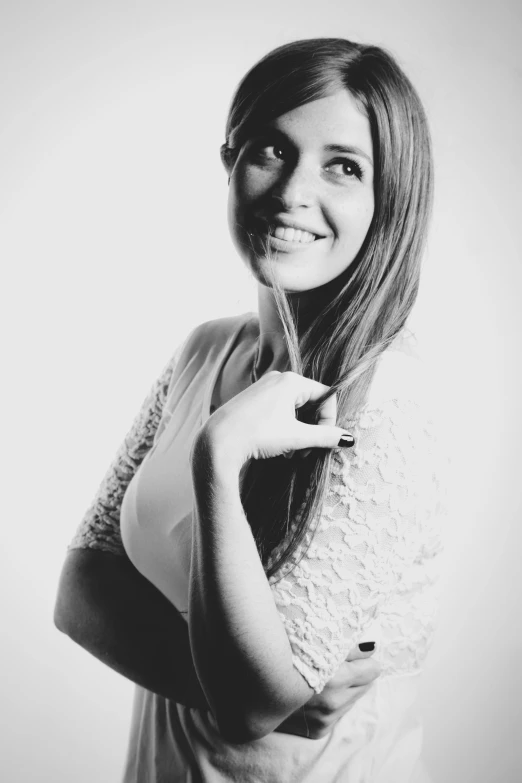 a black and white photo of a woman, inspired by Emma Ríos, cute smile, 'white background'!!!, uploaded, indoor picture