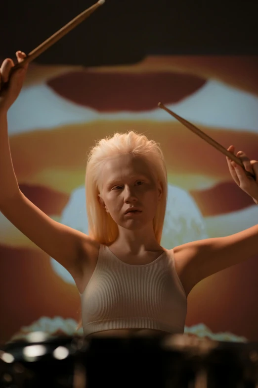 a woman that is standing in front of a drum, a surrealist sculpture, inspired by Odd Nerdrum, featured on reddit, interactive art, die antwoord ( yolandi visser ), perfectly lit. movie still, hyperrealistic teen, intense albino