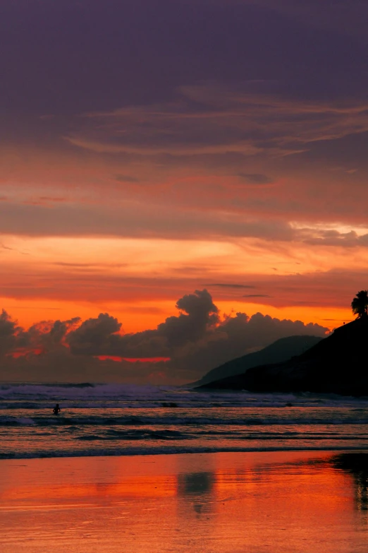 a man riding a surfboard on top of a sandy beach, inspired by Steve McCurry, sumatraism, ((sunset)), sunset panorama, mount, amazing colours