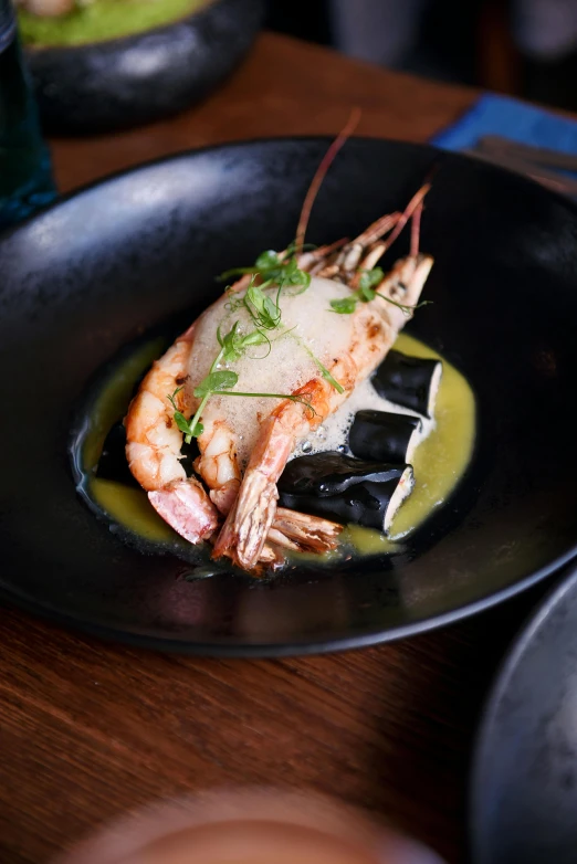 a close up of a plate of food on a table, ghostshrimp, sougetsu, deep black, thumbnail