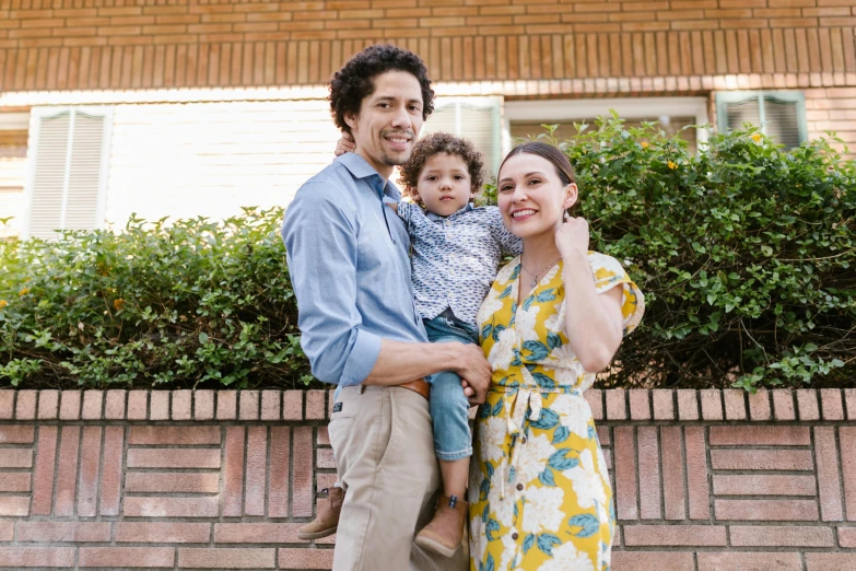 a man standing next to a woman and a child, a portrait, pexels contest winner, confident pose, spanish, thumbnail, 15081959 21121991 01012000 4k