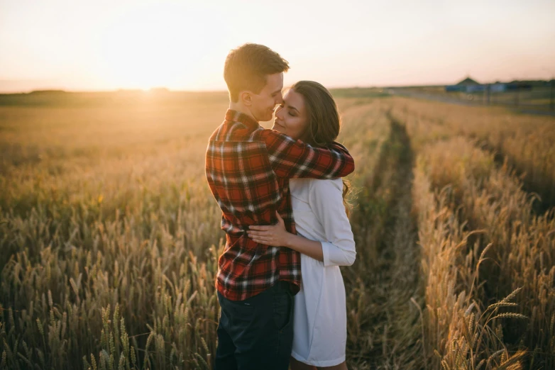 a couple embracing in a wheat field at sunset, pexels contest winner, handsome girl, rectangle, owen klatte, a single