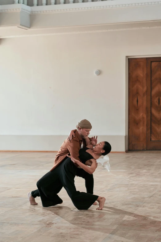 a couple of people that are standing in a room, by Nina Hamnett, arabesque, dancing with each other, on ground, no cropping, ignant