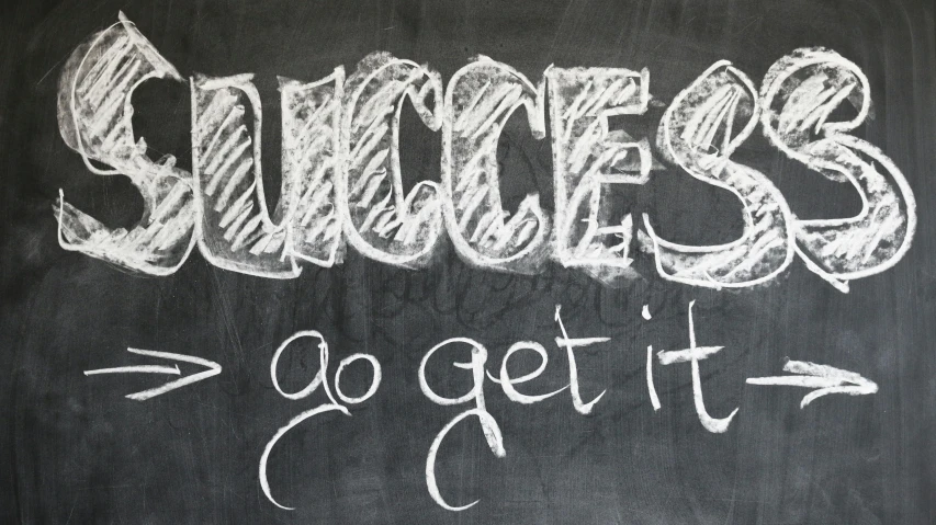 a chalkboard with the words success and go get it written on it, chalk art, by Heather Hudson, pixabay, graffiti, hollywood promotional image, surgery, very ornate, huge success