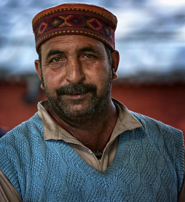 a close up of a person wearing a hat, a character portrait, inspired by Steve McCurry, pexels contest winner, hurufiyya, an afghan male type, a still of a happy, ornately dressed, a handsome