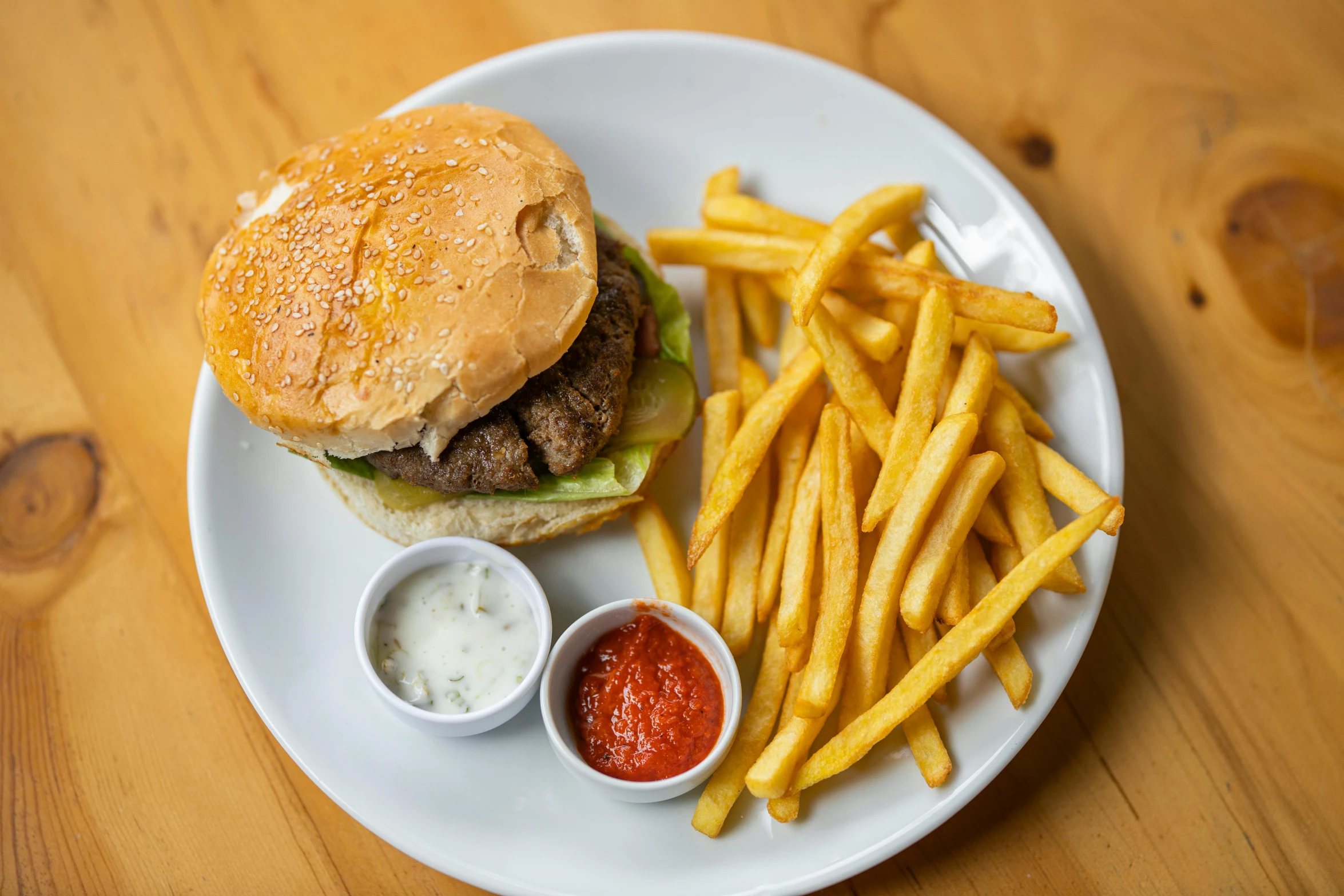 a white plate topped with a burger and french fries, a portrait, unsplash, ilustration, eastern european origin, h3h3, dolman