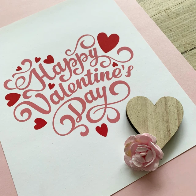 a valentine card sitting on top of a wooden table, pixabay, papercut, happy feeling, wall art, very very precise