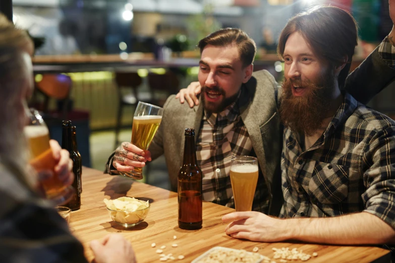 a group of men sitting at a table drinking beer, shutterstock, bushy beard, straya, reddit post, long night cap