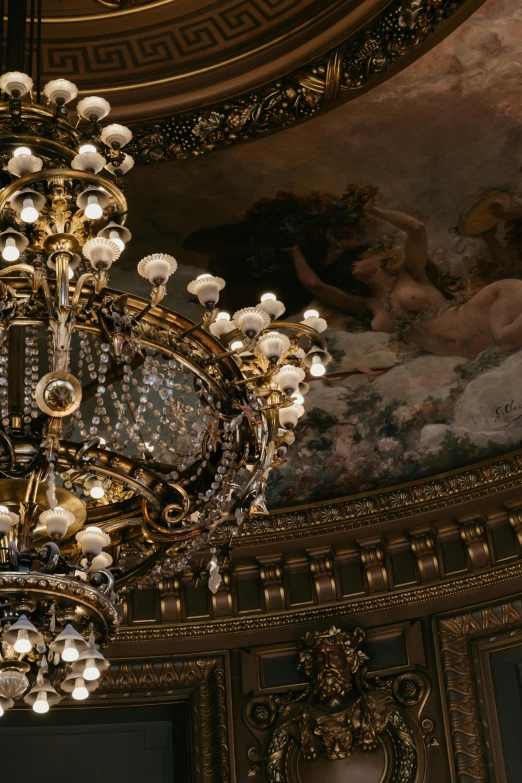 a chandelier hanging from the ceiling of a building, palatial scene, award - winning art, lots de details, grand library