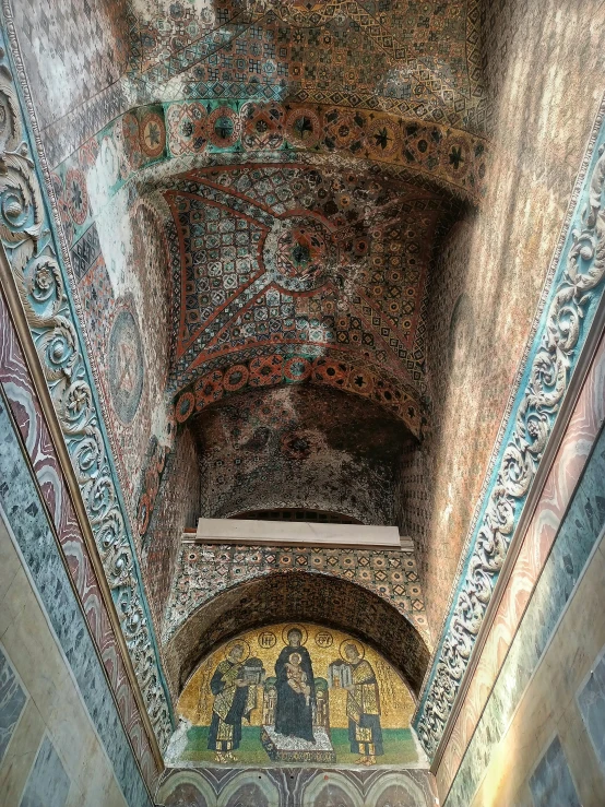 a painting on the ceiling of a building, a mosaic, pexels contest winner, romanesque, mosque interior, aqueduct and arches, lower and upper levels, looking down