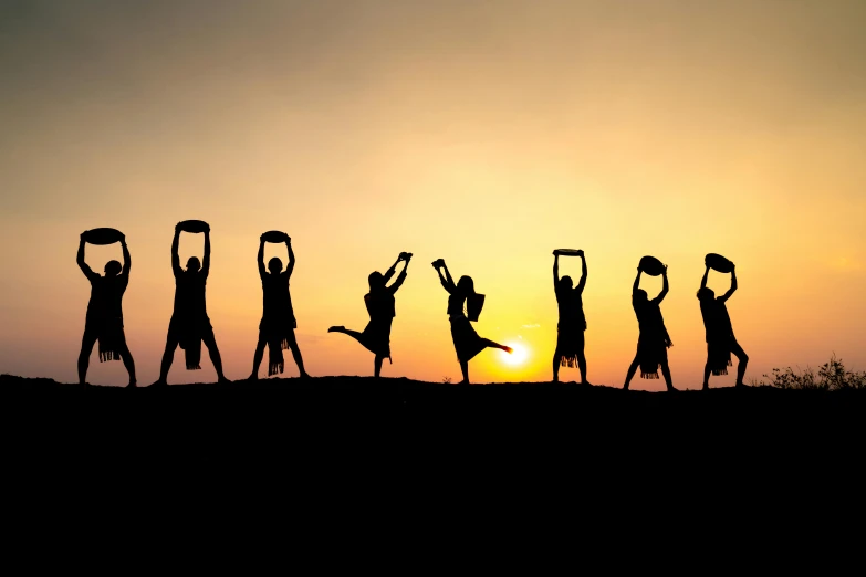 a group of people standing on top of a hill, inspired by Pierre Puvis de Chavannes, pexels contest winner, long arms, human silhouettes, avatar image, tai chi