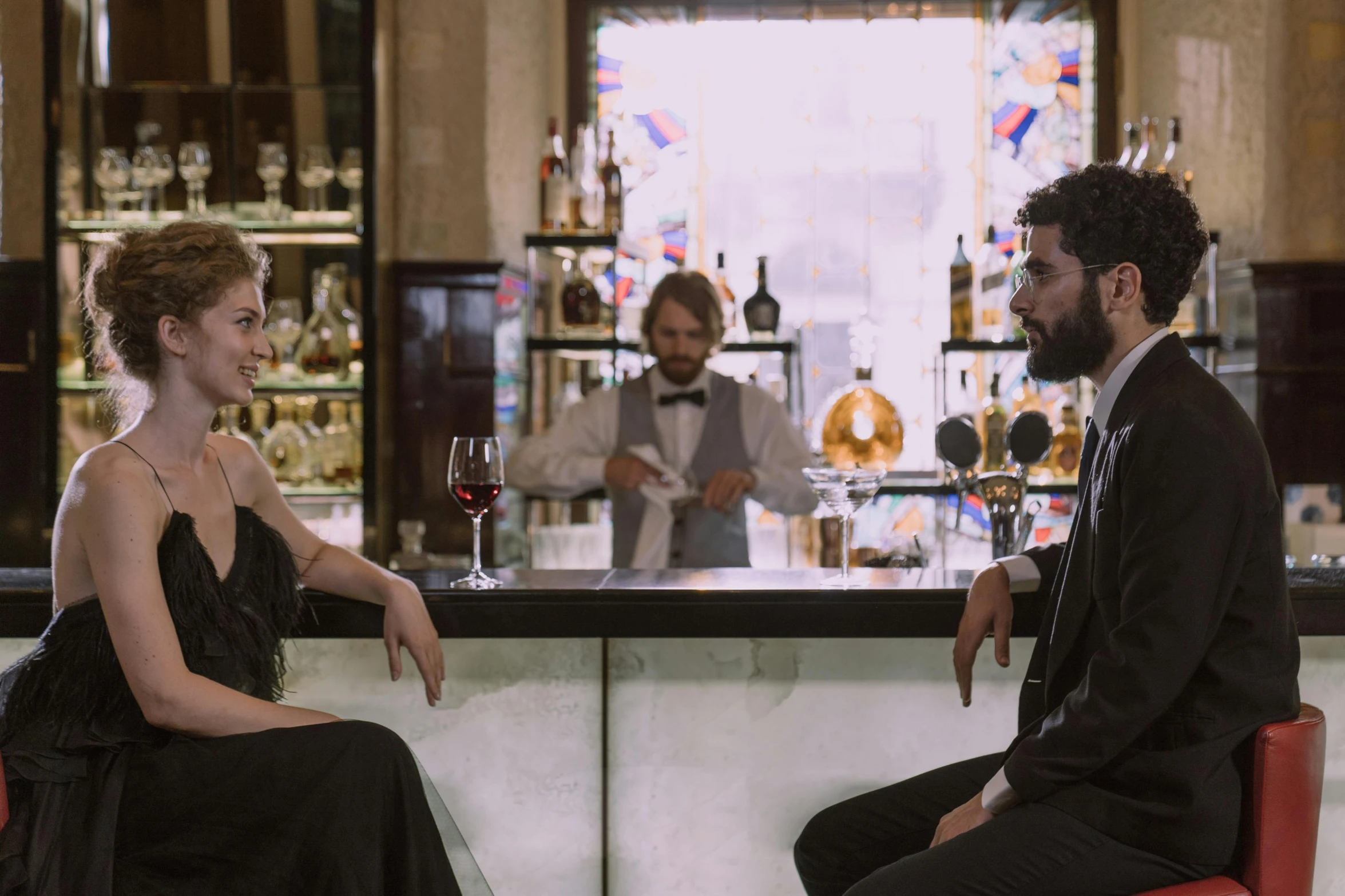 a man and a woman sitting at a bar, pexels contest winner, renaissance, film still promotional image, background : diego fazio, very elegant, spanish