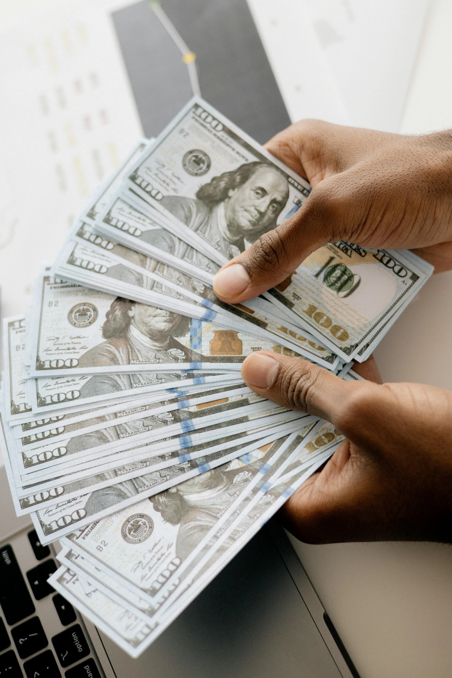 a person holding a bunch of money in front of a laptop, by Dan Christensen, pexels contest winner, renaissance, instagram post, jemal shabazz, stacked image, 🚀🌈🤩