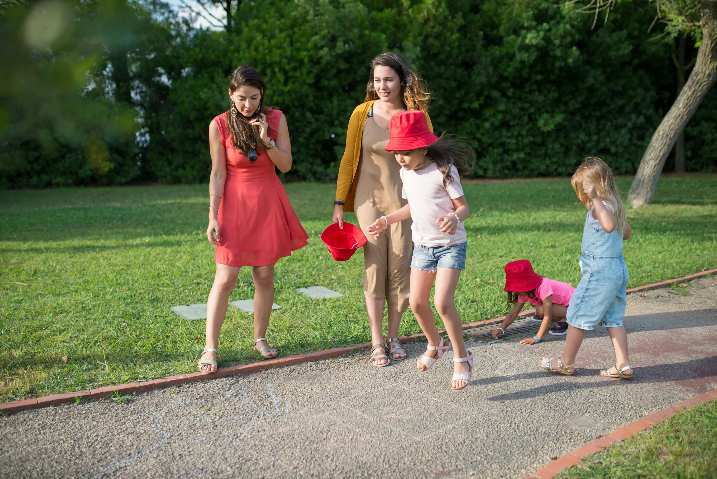 a group of people walking down a sidewalk, interactive art, casual playrix games, at home, red hat, chalked