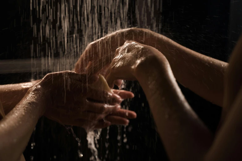 a close up of a person washing their hands, an album cover, inspired by Elsa Bleda, pexels contest winner, showers, holding each other, profile image, thumbnail