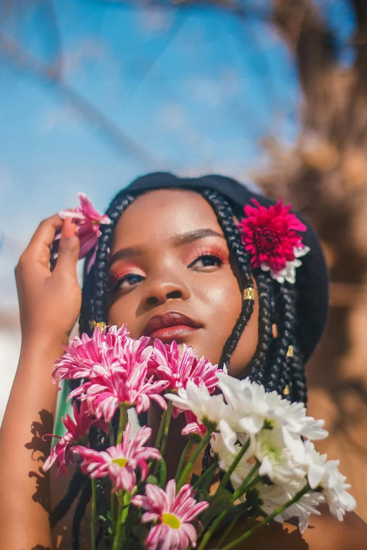 a woman holding a bunch of flowers in front of her face, pexels contest winner, afrofuturism, girl with plaits, black teenage girl, photoshoot for skincare brand, profile image