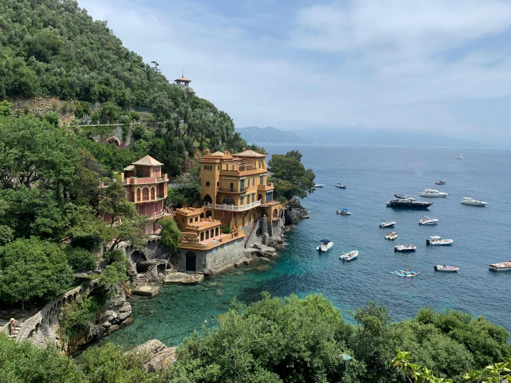 a group of boats floating on top of a body of water, pexels contest winner, renaissance, mix with rivendell architecture, seaside, italian, slide show