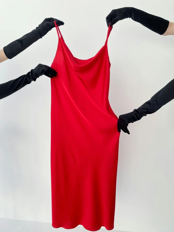 two women in black gloves holding a red dress, featured on reddit, wearing black camisole outfit, detailed product image, soft silk dress, y2k”