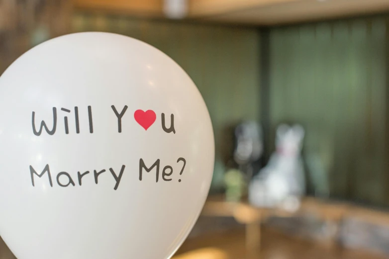 a white balloon with the words will you marry me written on it, pexels contest winner, pokimane, casually dressed, harry wingfield, thumbnail