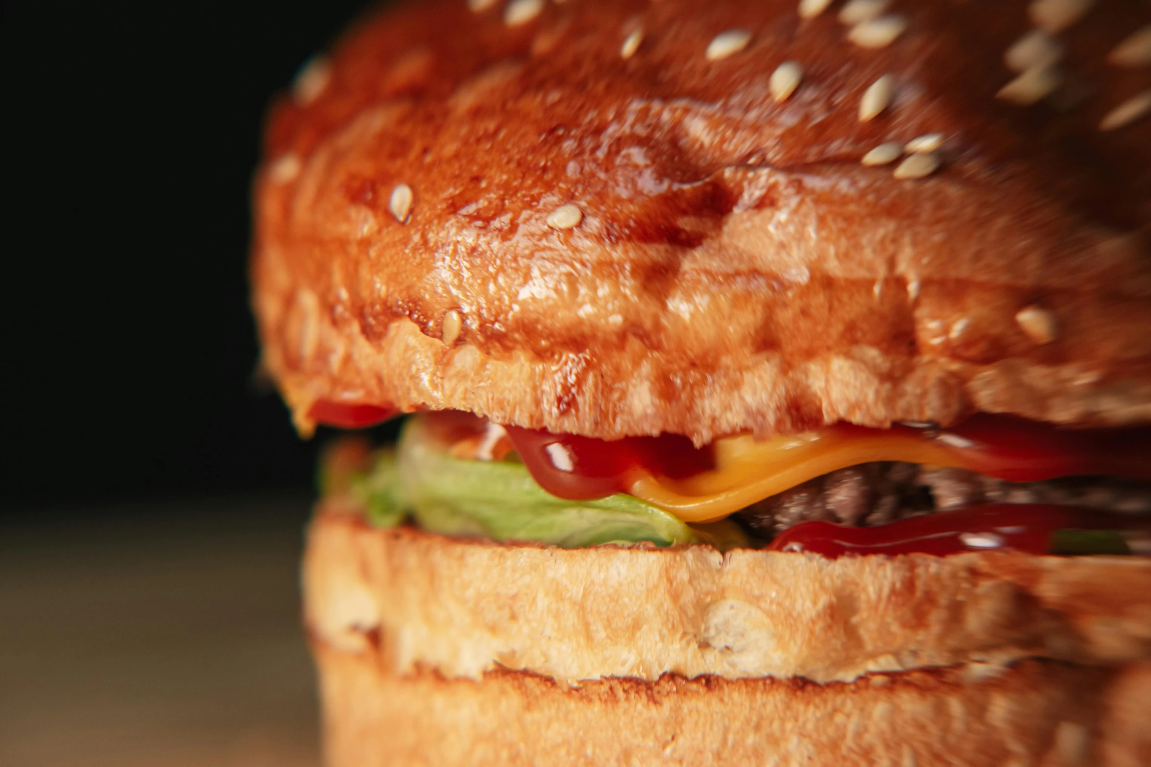 a hamburger sitting on top of a wooden table, pexels, hyperrealism, inside a cavernous stomach, crispy buns, close-up photo, hasselblatt