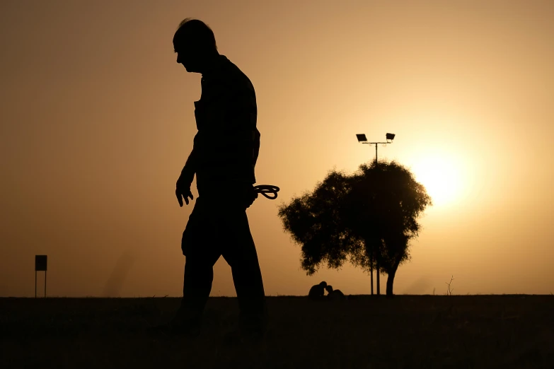 a silhouette of a man walking with a skateboard, by Eglon van der Neer, happening, iraq nadar, at a park, ap art, suns