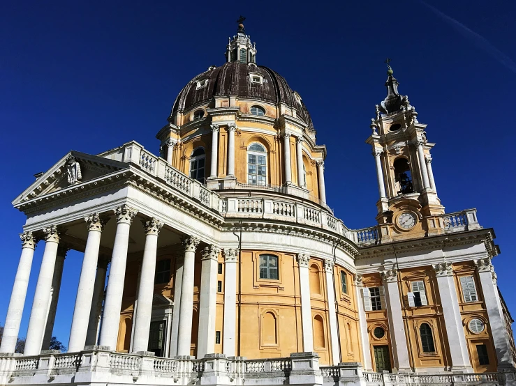 a large white and yellow building with a clock tower, inspired by Gian Lorenzo Bernini, pexels contest winner, baroque, domes, pink marble building, profile image, square