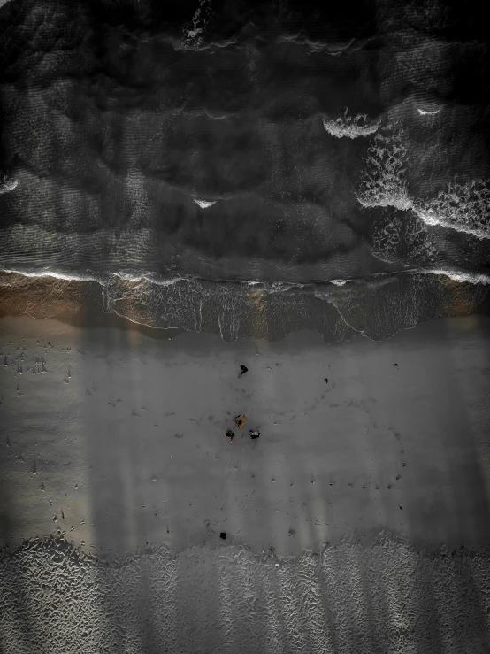 a couple of people standing on top of a beach next to the ocean, inspired by Andreas Gursky, unsplash contest winner, conceptual art, detailed shadows and textures, street lights water refraction, top - down photograph, 15081959 21121991 01012000 4k