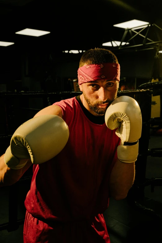 a man in a red shirt and white boxing gloves, by Matt Cavotta, square, sharply focused, 8k octan photo, battered