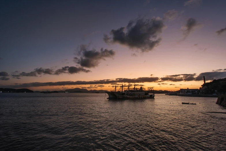 a boat that is sitting in the water, by Joseph Severn, pexels contest winner, happening, sunset with cloudy skies, okinawa japan, victorian harbour night, thumbnail