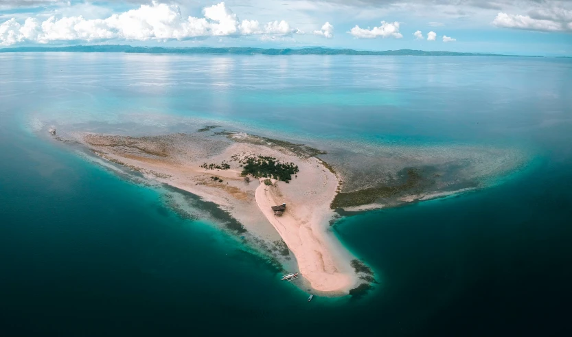 a small island in the middle of the ocean, by Robbie Trevino, pexels contest winner, hurufiyya, sand banks, split near the left, thumbnail, mami wata