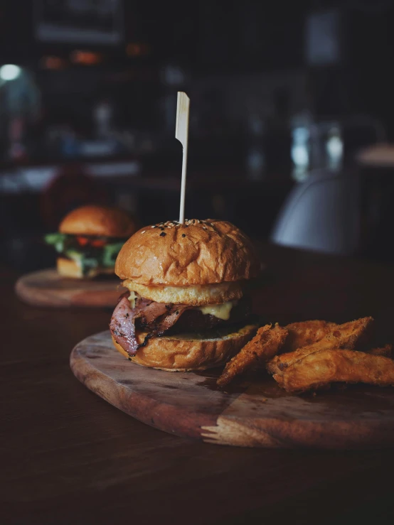 a couple of burgers sitting on top of a wooden cutting board, by Jesper Knudsen, pexels contest winner, thumbnail, restaurant menu photo, profile image, cinematic photo