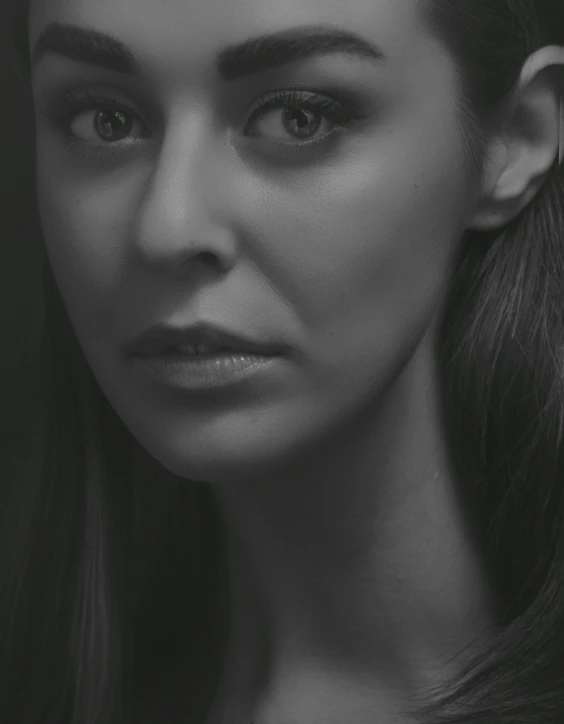 a black and white photo of a woman with long hair, pexels contest winner, hyperrealism, underexposed grey, 8k portrait render, portrait mode photo, desaturated!