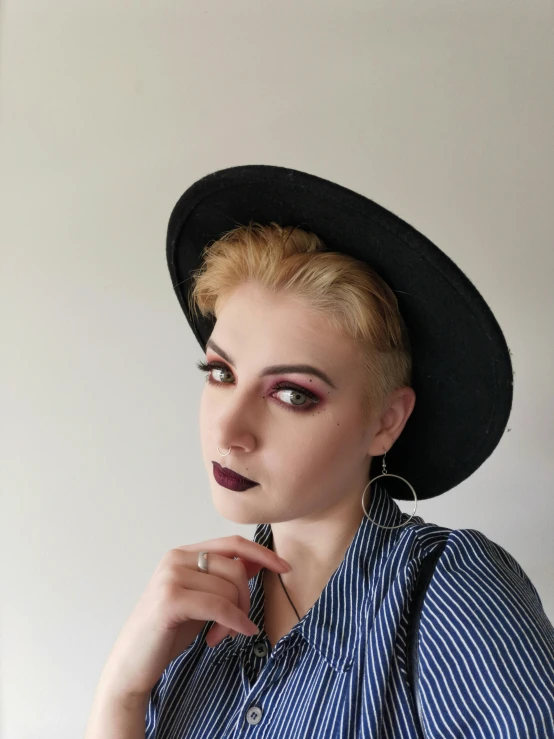 a woman with blonde hair wearing a black hat, inspired by Carl Walter Liner, featured on reddit, 90s make-up, profile image, amouranth, non-binary