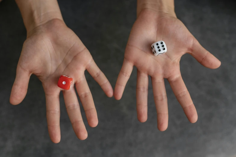 a pair of hands holding a red and white dice, unsplash, hyperrealism, square, miniatures, ability image