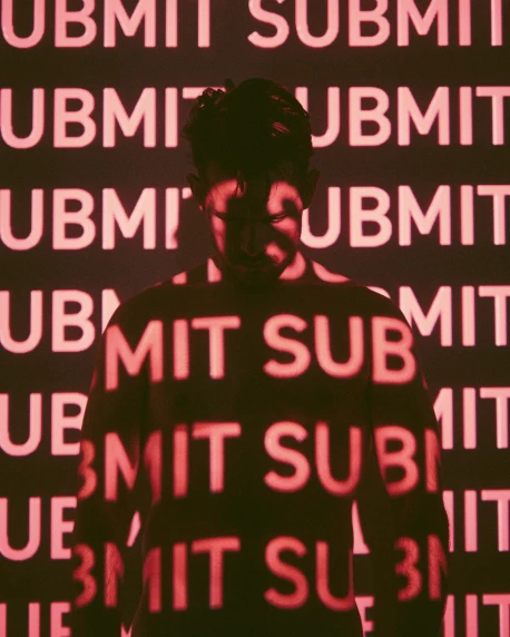 a man standing in front of a sign that says summit summit summit summit summit summit summit summit, an album cover, by Michael Sittow, tumblr contest winner, futurism, soft red lights, an epic non - binary model, berghain, profile picture