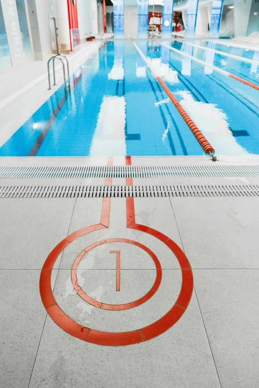 a swimming pool filled with lots of blue water, by Jacob Toorenvliet, shutterstock contest winner, modernism, background a gym, graphic detail, 15081959 21121991 01012000 4k, bronze