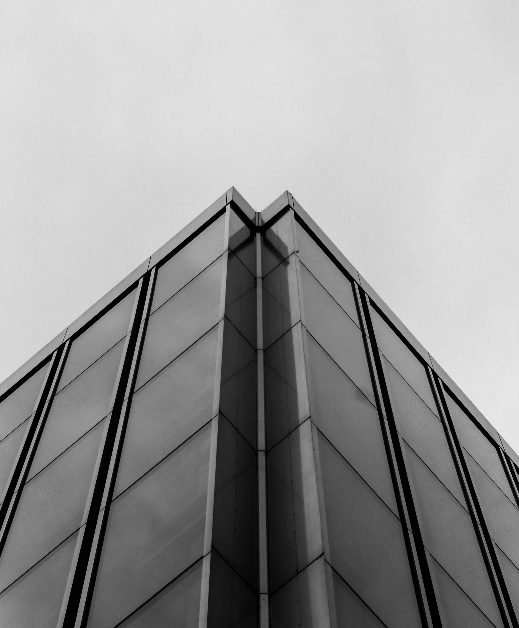 a black and white photo of a tall building, unsplash, minimalism, square, angular metal, full of glass. cgsociety, 9 4