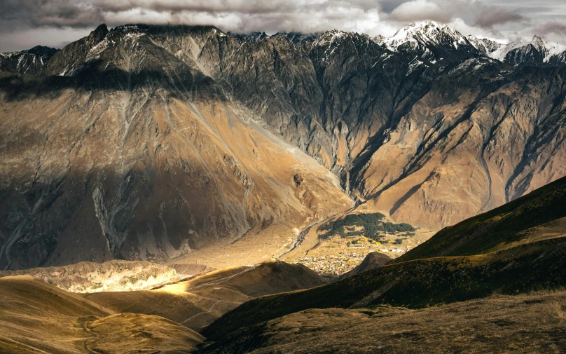 a view of a valley with mountains in the background, by Peter Churcher, pexels contest winner, hurufiyya, epic lighting from above, omar shanti himalaya tibet, erosion algorithm landscape, fine art print