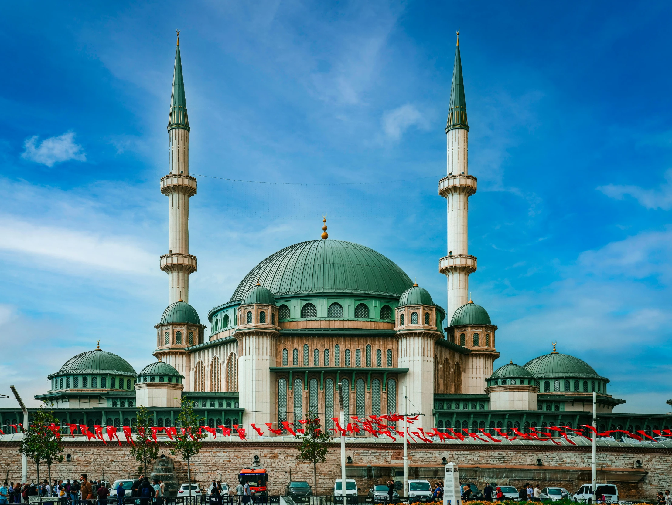 a group of people standing in front of a large building, by Abdullah Gërguri, pexels contest winner, hurufiyya, turquoise, lead - covered spire, paisley, bosnian