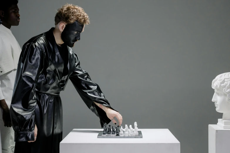 a couple of men playing a game of chess, an album cover, inspired by Michelangelo Merisi da Caravaggio, synthetism, futuristic glossy latex suit, showstudio, grey porcelain sculpture, youtube thumbnail