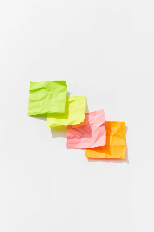 several pieces of paper sitting on top of each other, trending on pexels, soft neon, 1 6 x 1 6, moderate colors, notes