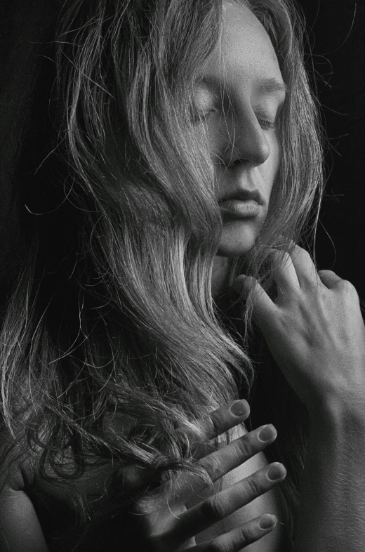 a black and white photo of a woman with long hair, pexels contest winner, hyperrealism, blond hair, hands, thoughtful ), photograph”